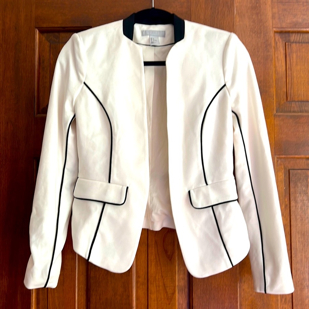 Women’s white and black blazer